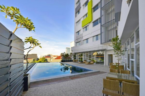 Отель Whiz Prime Hotel Hasanuddin Makassar  Макассар